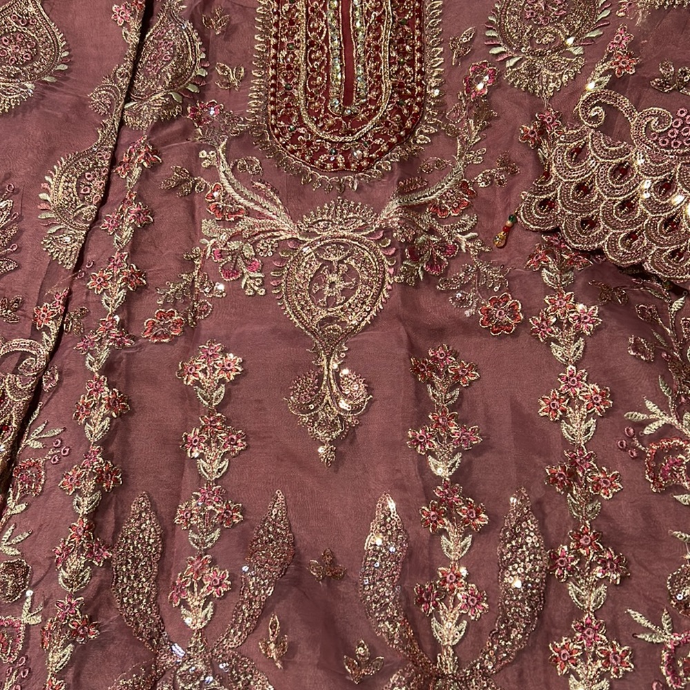 Pakistani designer Emaan Adeel Georges heavy embroidered dress